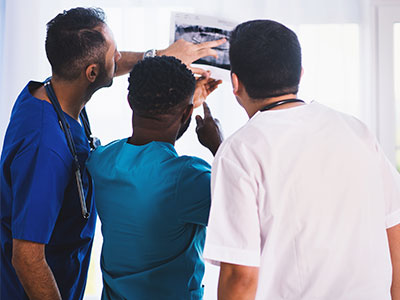 Doctors examining an xray