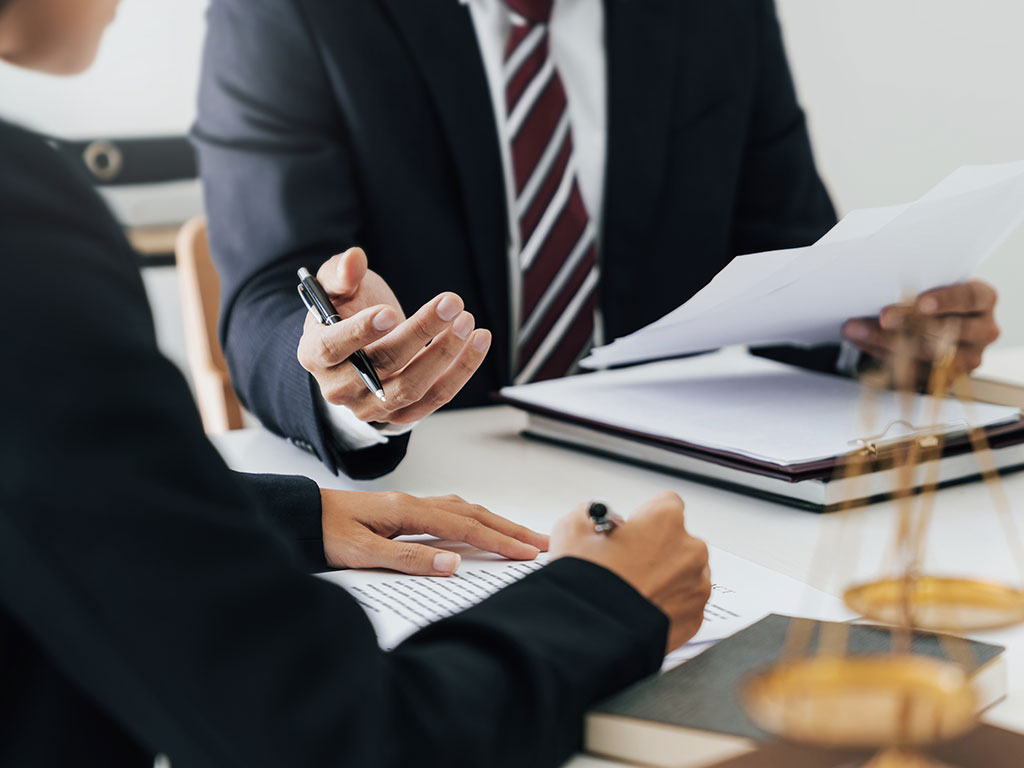 Man and woman in legal discussion